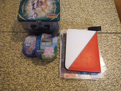 Large Pokemon Trading Card Game Lot: 2 Tins, 3 Mini Tins, Binder, & Hundreds of Cards
