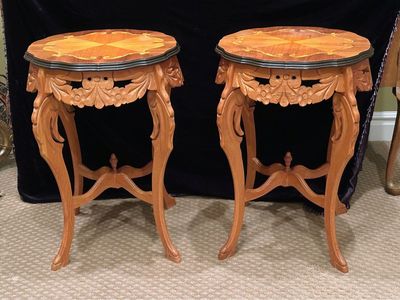 vintage French Louis XV style accent tables featuring intricate marquetry inlaid tops and detailed carved legs.