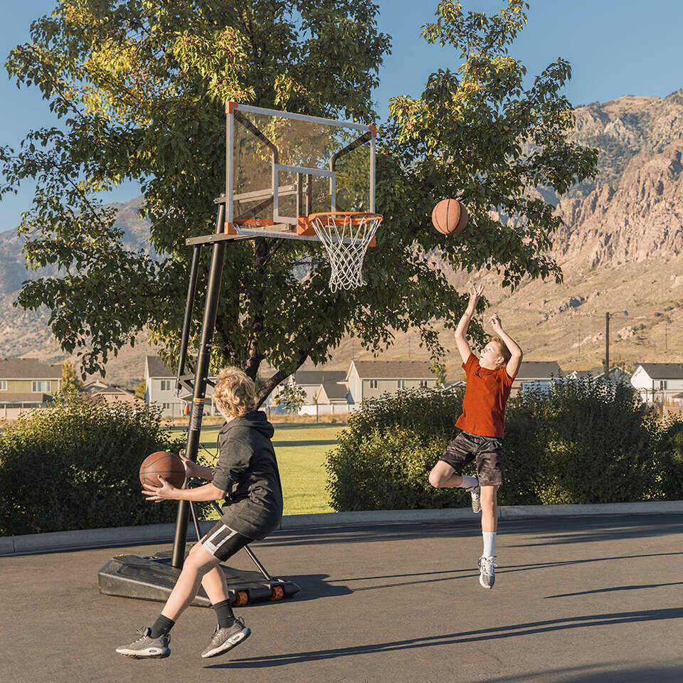 WAREHOUSE SALE! Quality 50" Portable Basketball Hoop 7.5 to 10ft height- Get Yours Today!