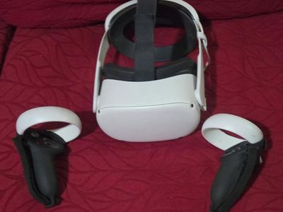 Oculus Quest 2 with elite strap and 2 drifting controllers! Trades considered!
