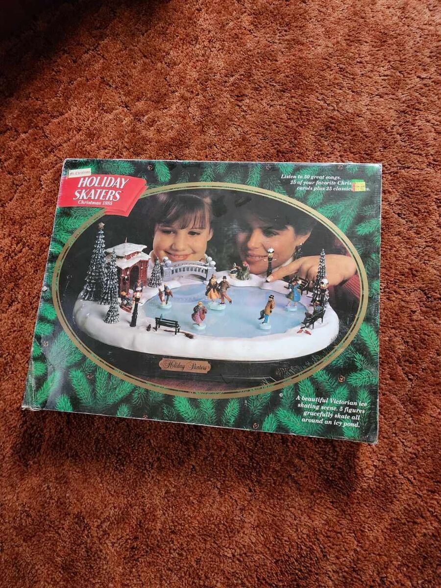 Mr christmas holiday skaters