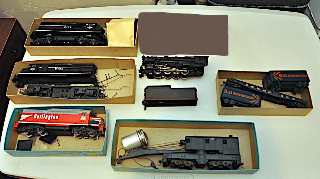 Vintage HO scale model railroad cars and engines