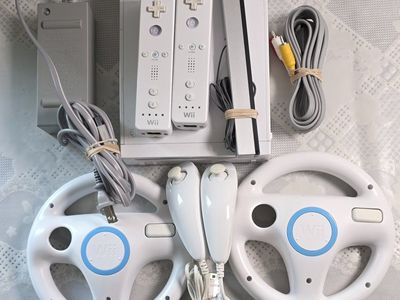 Nintendo Wii Console Bundle with Controllers, Nunchucks, Wii Wheels & Cables