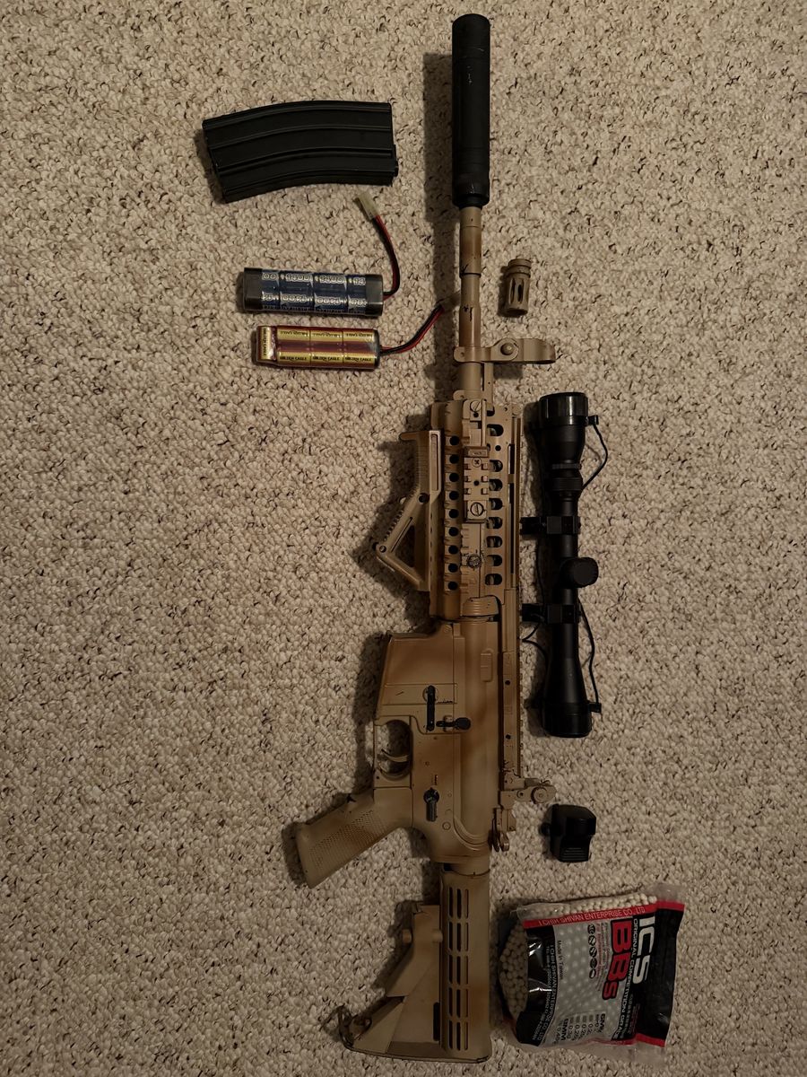 Airsoft Rifle with Scope, Red Dot sight, 2 batteries, magazine. BB’s