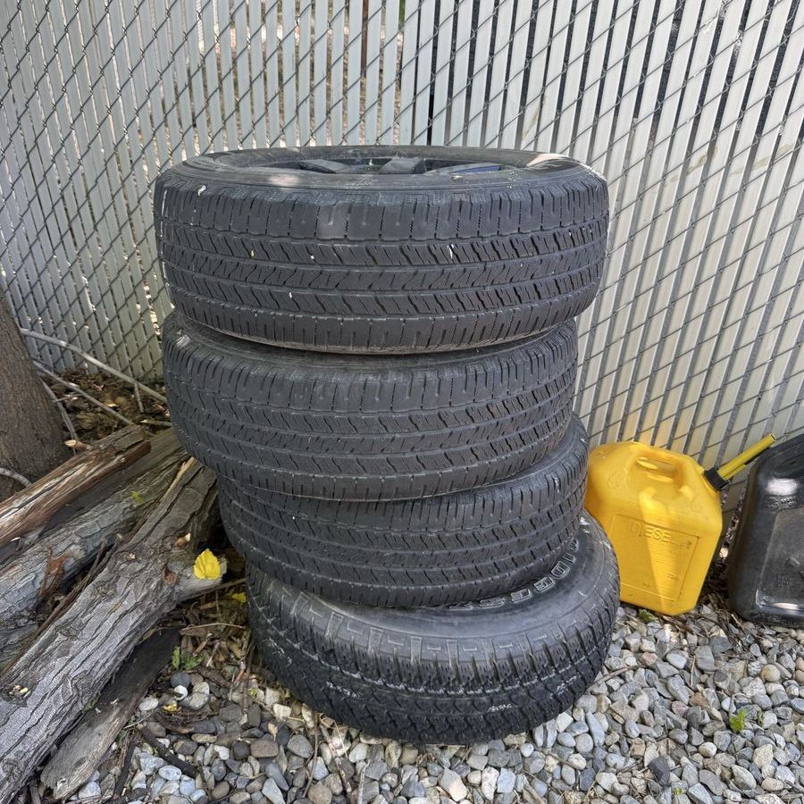FREE -Jeep 255/70R18 113H Tires with Black Rims - Set of 4
