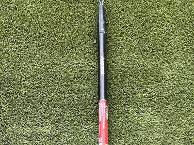 Landscaping/Garden tool: double sided rake with fiberglass handle.