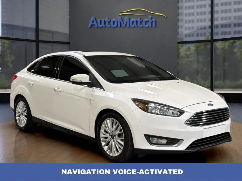 2018 Ford Focus Titanium — rebuilt & branded title, 13% below market