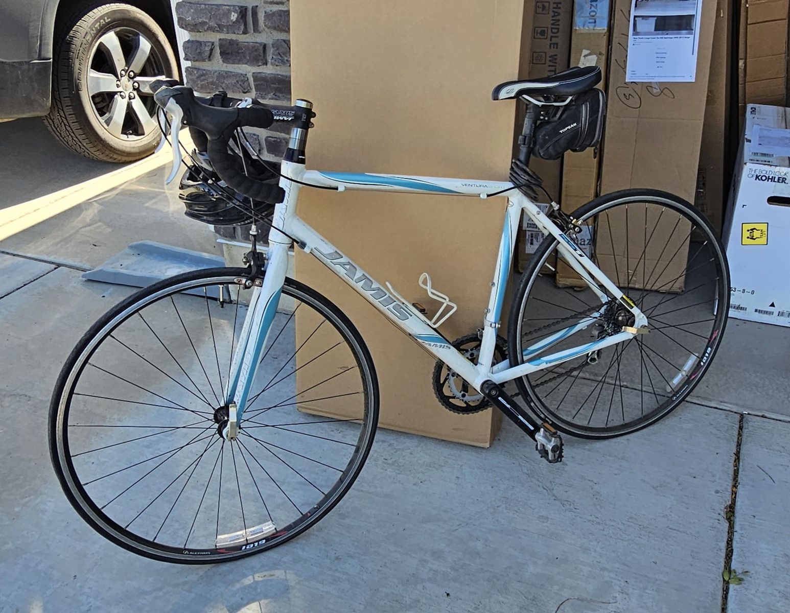 Jamis Ventura Sport Road Bicycle size 54.  Used for training and one race.  (includes helmet)
