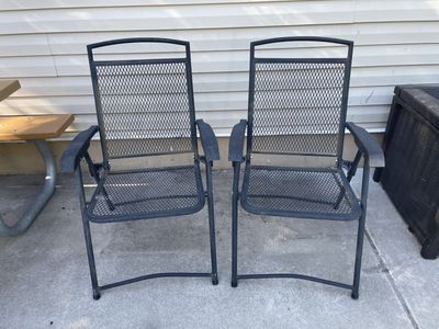 Black folding metal outdoor chairs