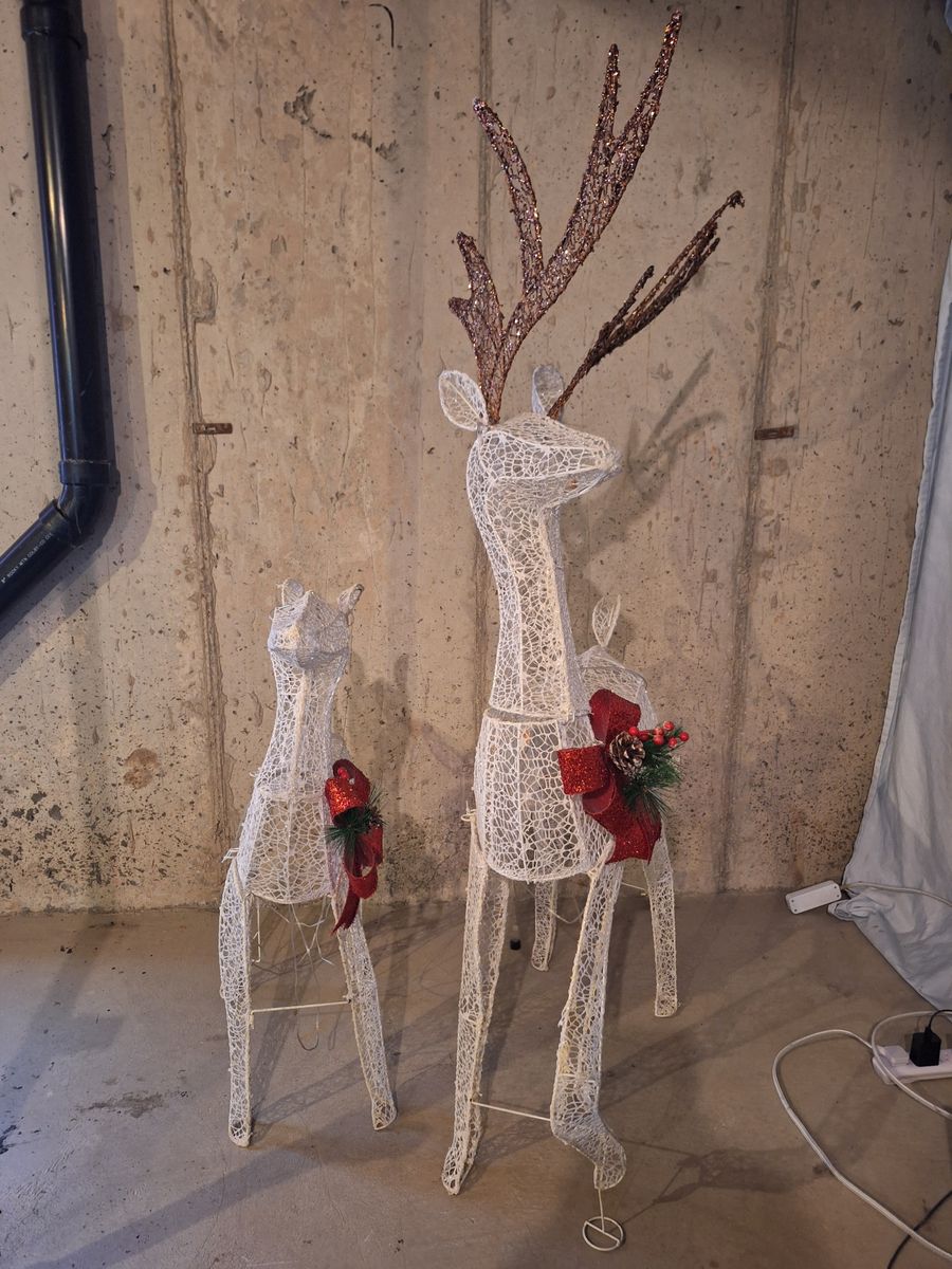 Reindeer and snow shovels