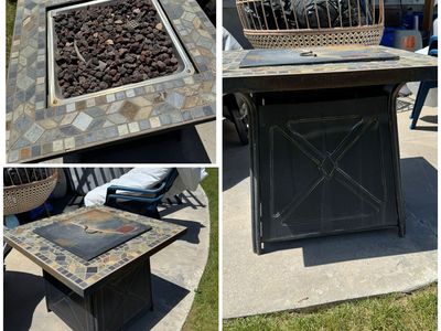 Nice gas fire pit propane tank not included.