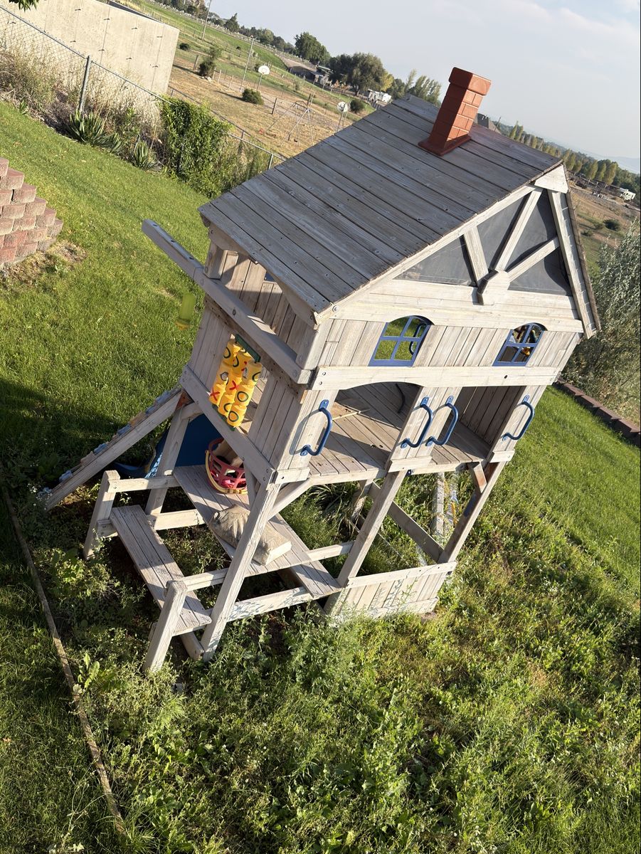 Wooden Backyard Playset with Wave Slide, Climbing Wall, and Playhouse