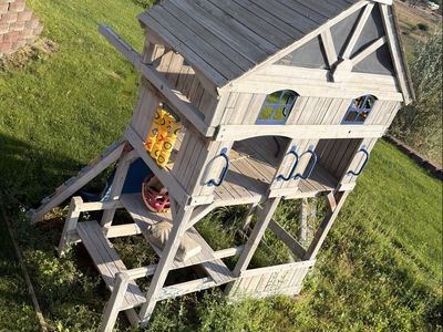 Wooden Backyard Playset with Wave Slide, Climbing Wall, and Playhouse