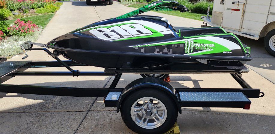 2017 Kawasaki 1500 SXR with many included options and single ski trailer