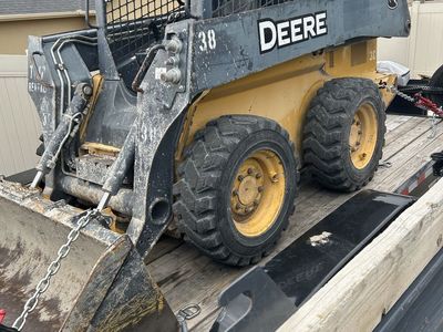 Skidsters, dump trailers, mini excavators for rent