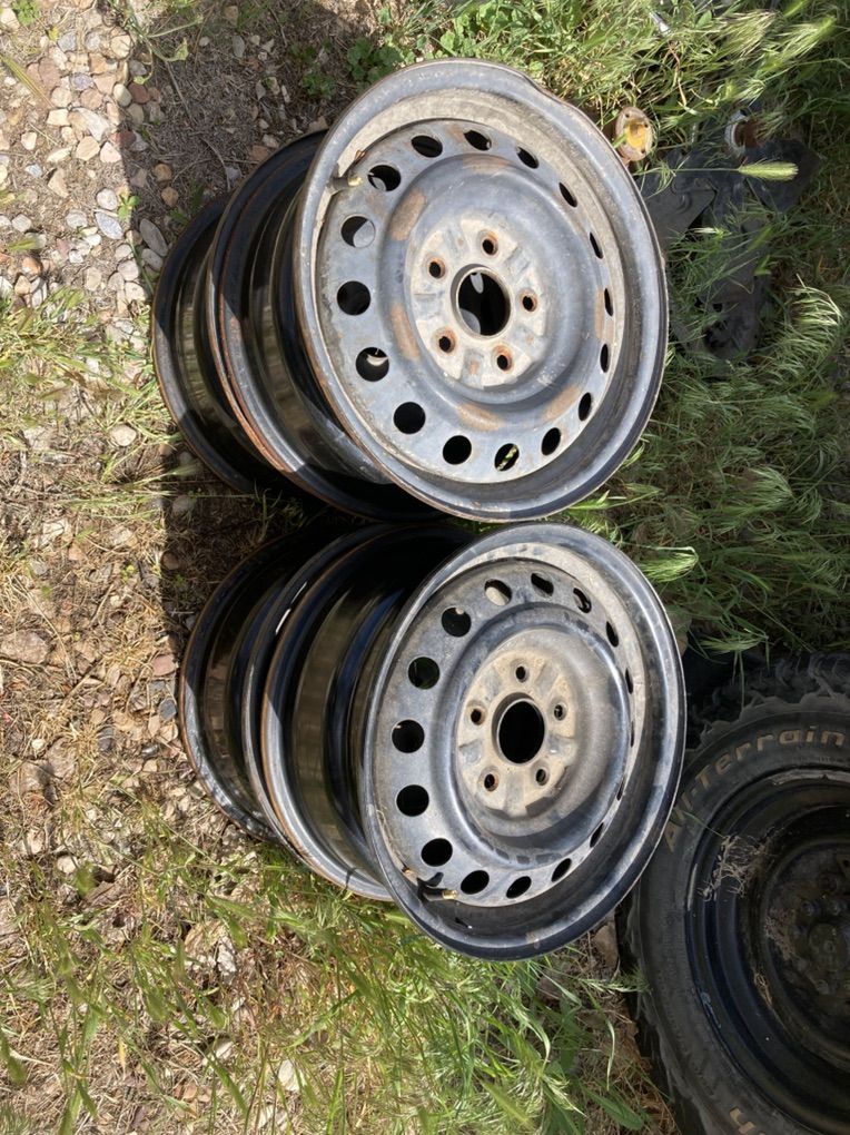 4 toyota camry rims   5 lug  black steel 15  15 inch