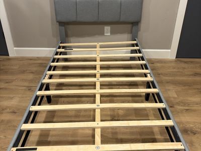 Gray Upholstered Twin Bed Frame with Tufted Headboard and Wood Slats