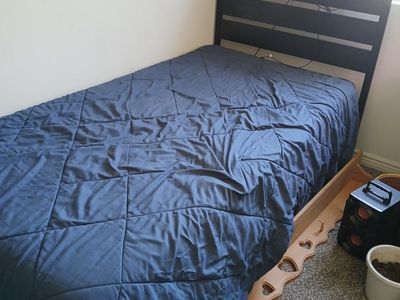 Twin Size Bed Frame with Headboard, sheets, and Mattress