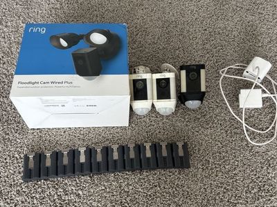 Ring Floodlight Cam Wired Plus, 3 Ring Stick Up Cams, and 17 Ring Quick Release Battery Packs