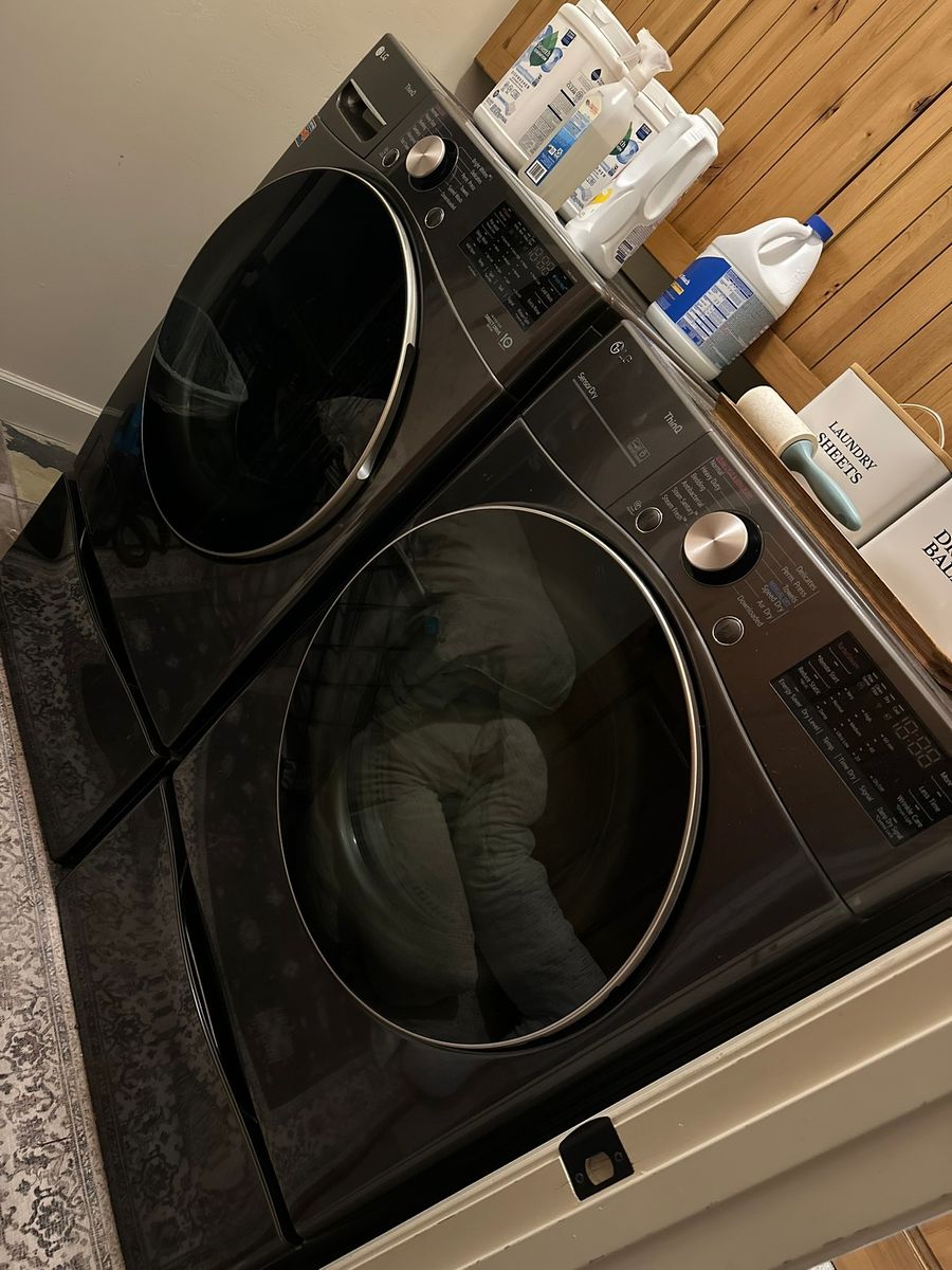 Black Stainless Steel, Electric, paid $3,400 includes Drawer Bases. LG WM9000HVA Front Load Washer & LG DLEX9000V Dryer