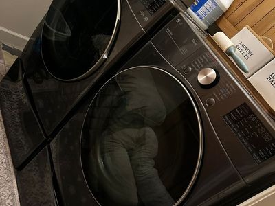 Black Stainless Steel, Electric, paid $3,400 includes Drawer Bases. LG WM9000HVA Front Load Washer & LG DLEX9000V Dryer