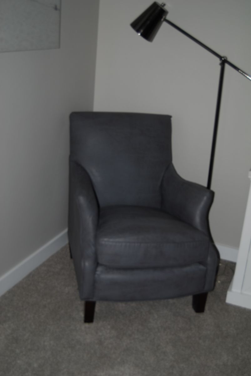 Dark grey leather arm chair like new for sale