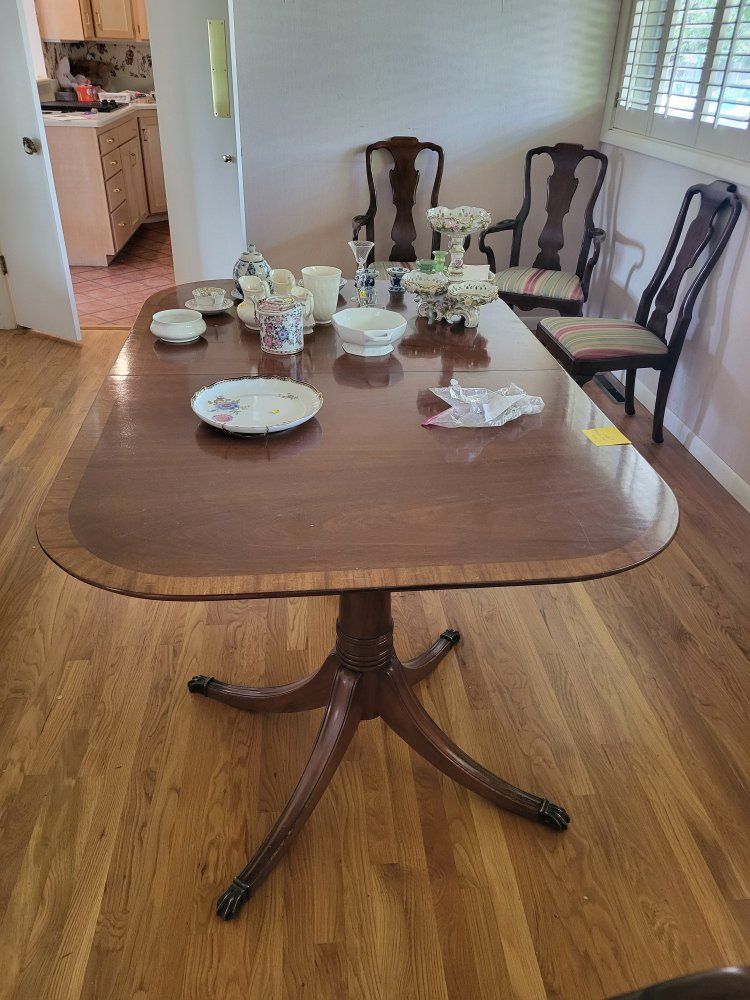 Dining table with 5 chairs and one arm chair