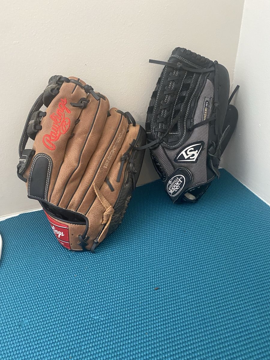 SET OF 2 SOFTBALL GLOVES 1 RIGHT 1 LEFT HANDED. 13” & 12.75 “