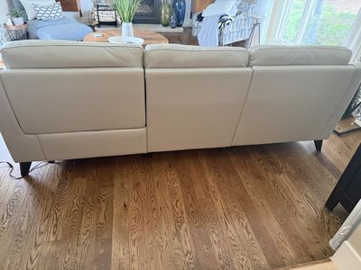 White Leather Sectional Sofa with Recliner and USB Charger