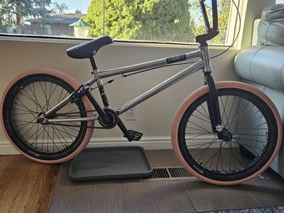 Haro Midway BMX Bike Chrome with Pink Tires and Pivotal Seat