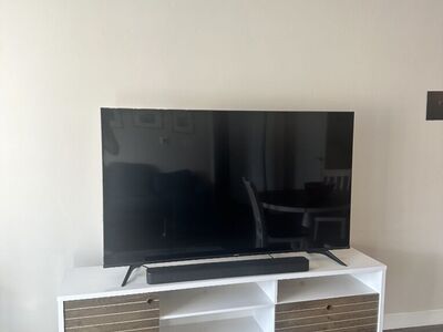 Hisense TV+ Bose soundbar+ White rustic TV Stand