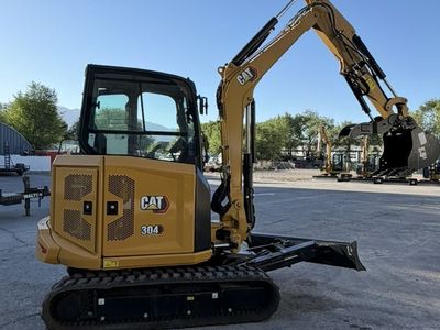Cat 304 Mini Excavator For Rent. 4 ton 40 Class with Thumb and Blade