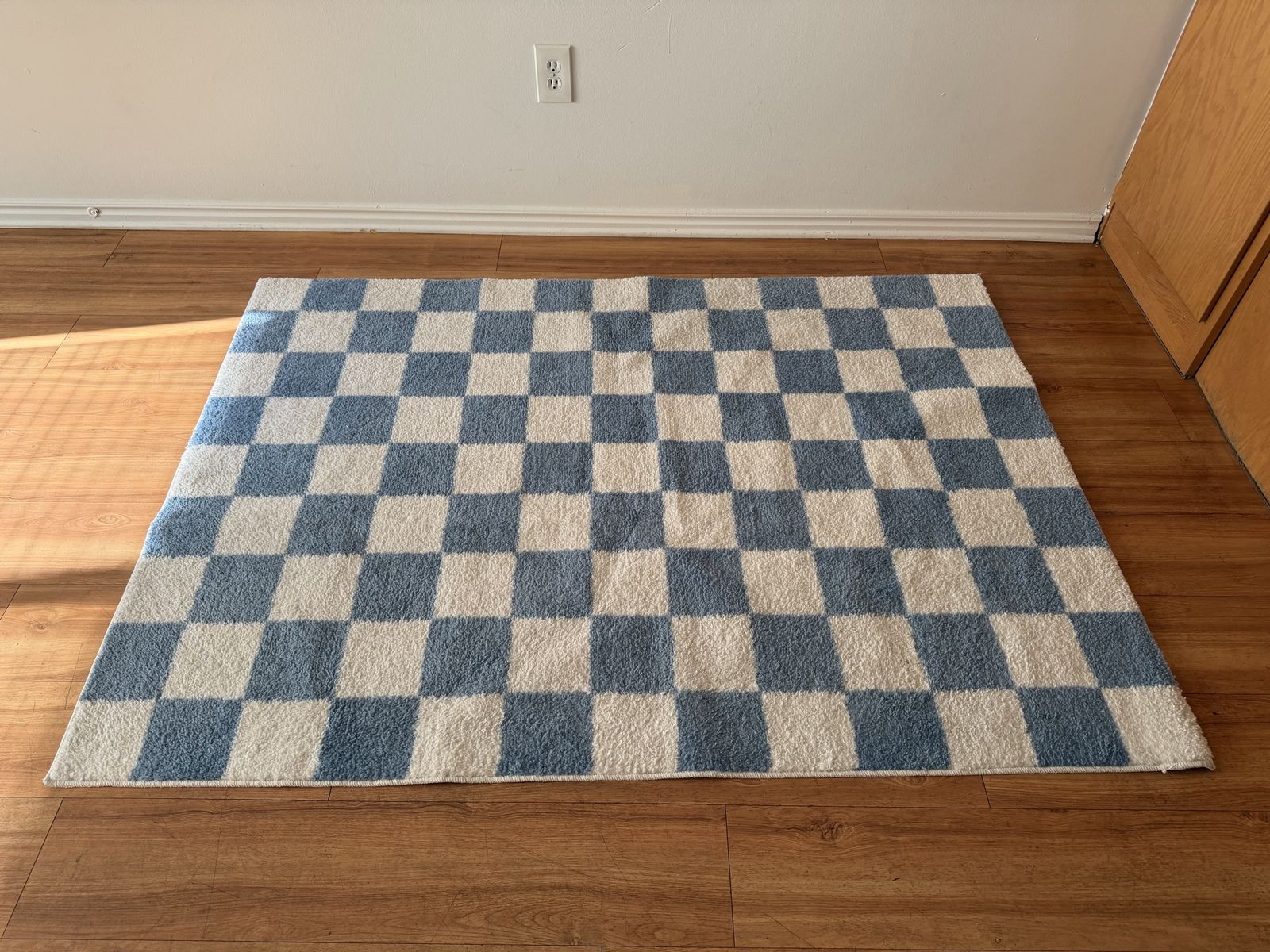 Checkered blue room rug
