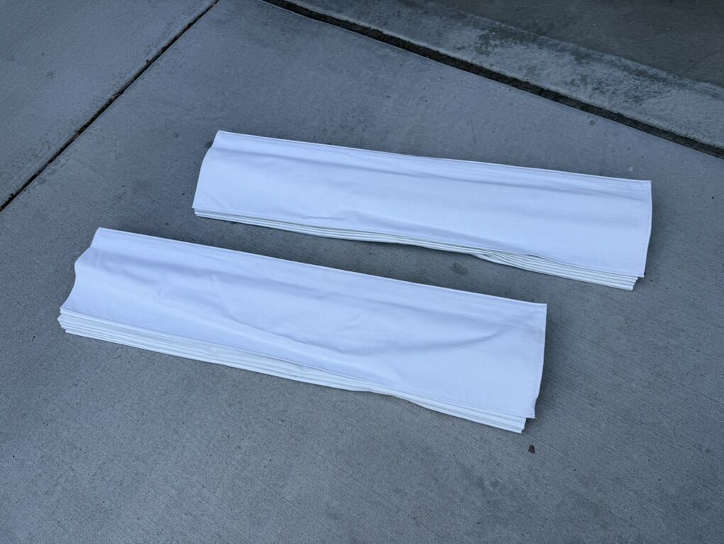 Two 34 Wide White Roman Shades