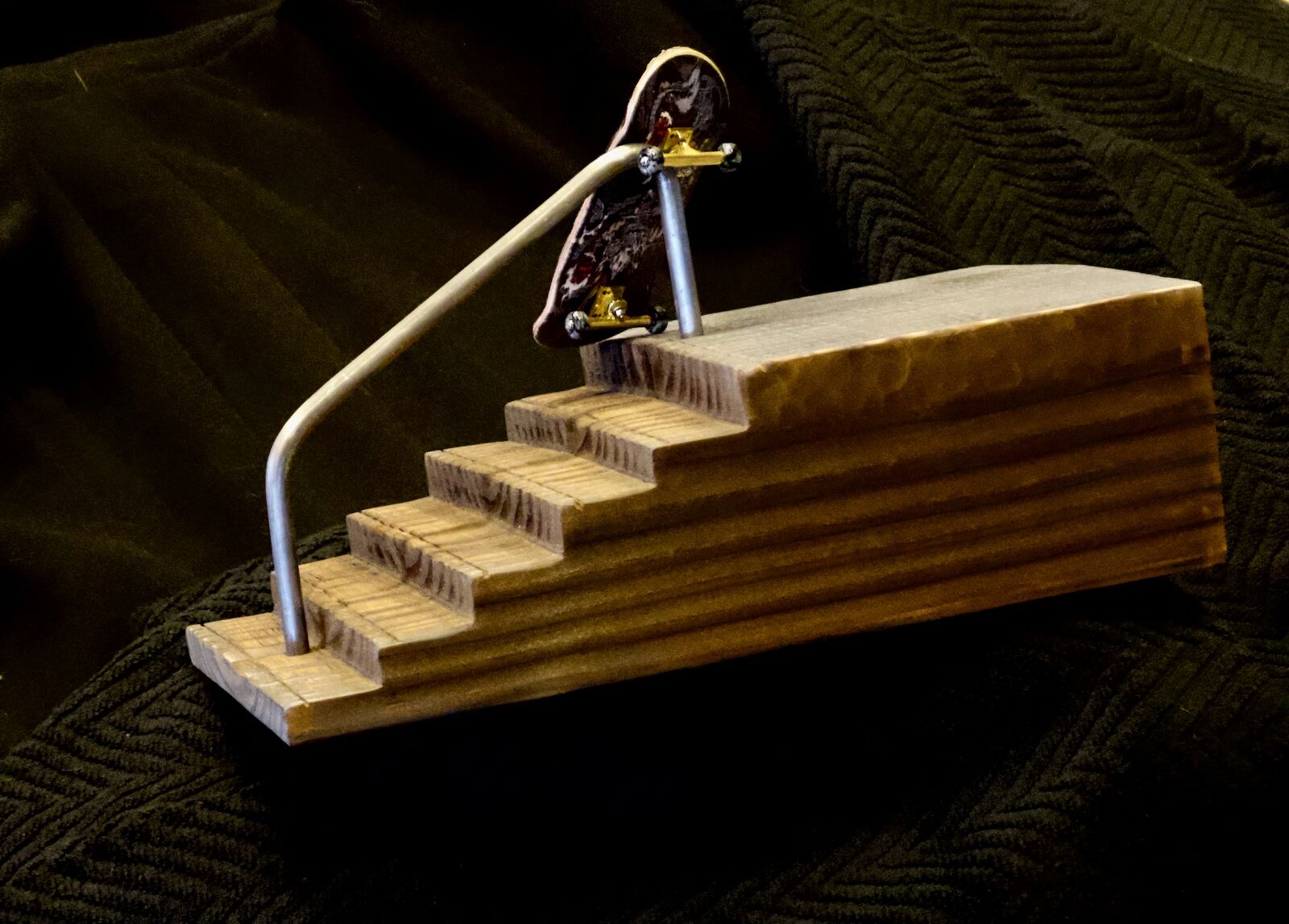 Fingerboard stair obstacle.