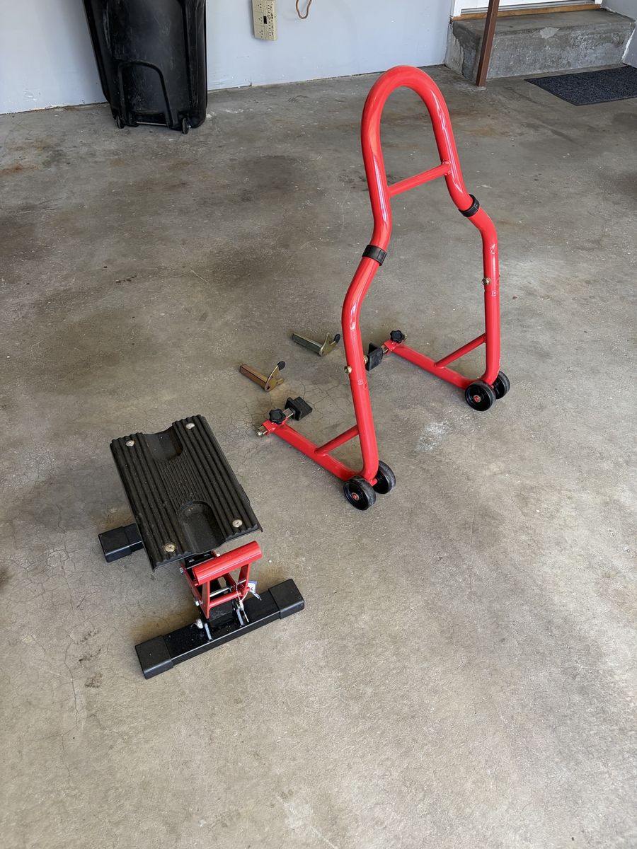 2 motorcycles stands
