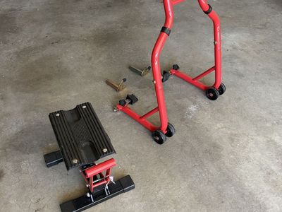 2 motorcycles stands