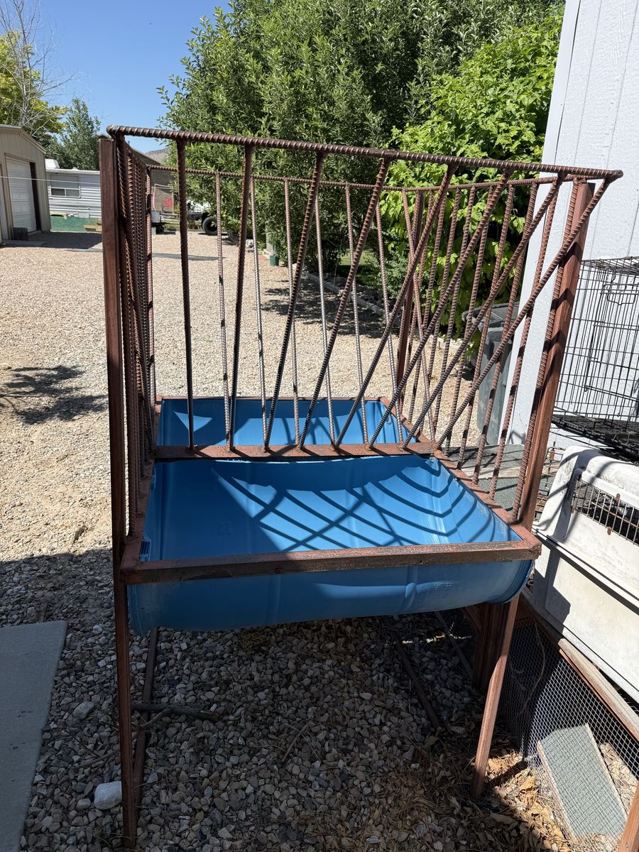 Heavy-Duty Metal Hay Feeder with Blue Barrel Trough - Durable Livestock Feeding Solution