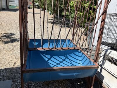 Heavy-Duty Metal Hay Feeder with Blue Barrel Trough - Durable Livestock Feeding Solution