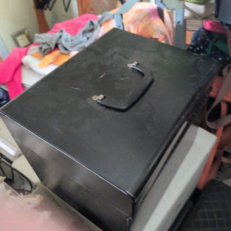 black metal box with lock