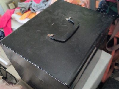 black metal box with lock