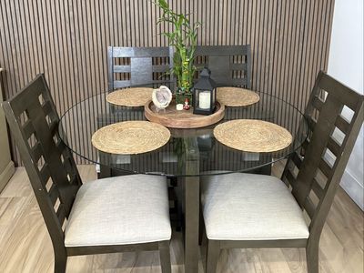 Round Glass Top Dining Table Set with 4 Upholstered Chairs
