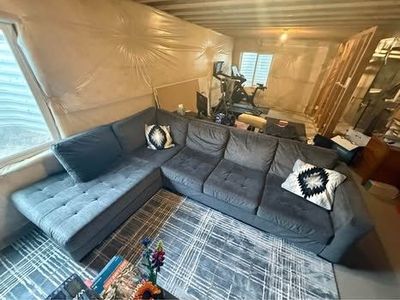 Charcoal gray sectional couch