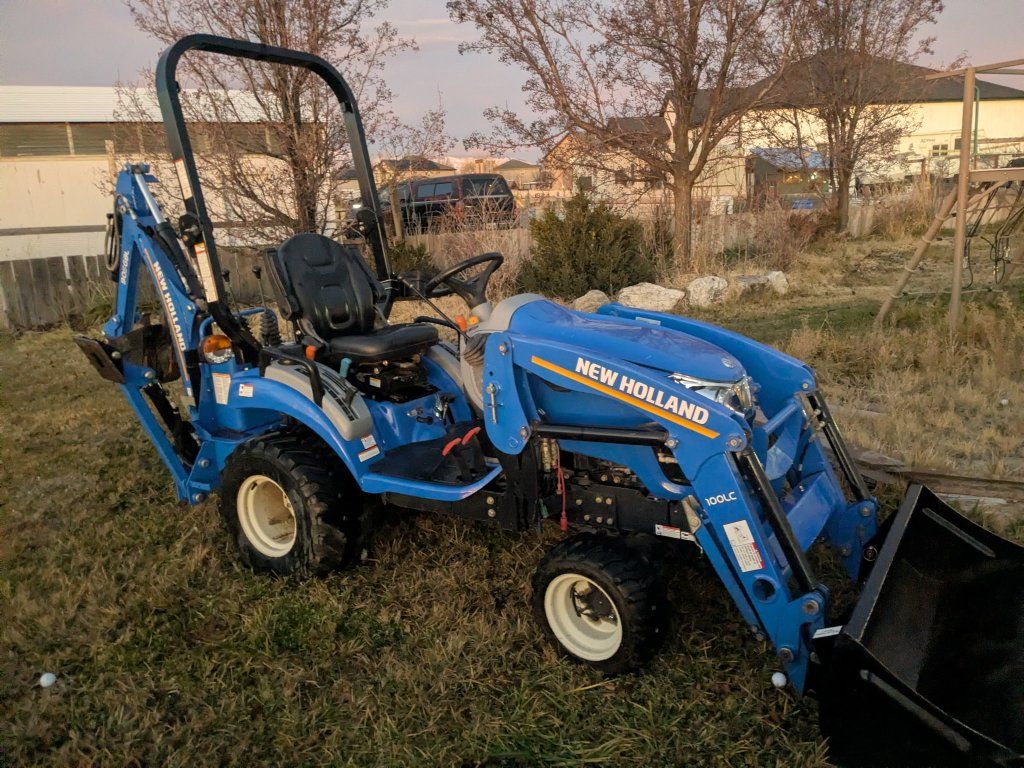 Tractor with backhoe