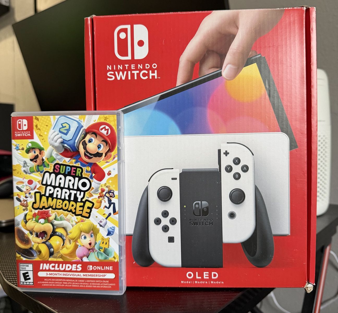 Nintendo Switch OLED with Super Mario Party Jamboree Game
