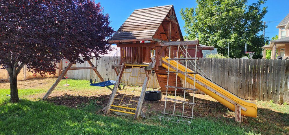 Rainbow Play Systems Wood Playset - Castle Series with Slide, Swings, and Climbing Features