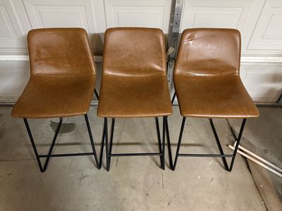 Faux leather backed barstools