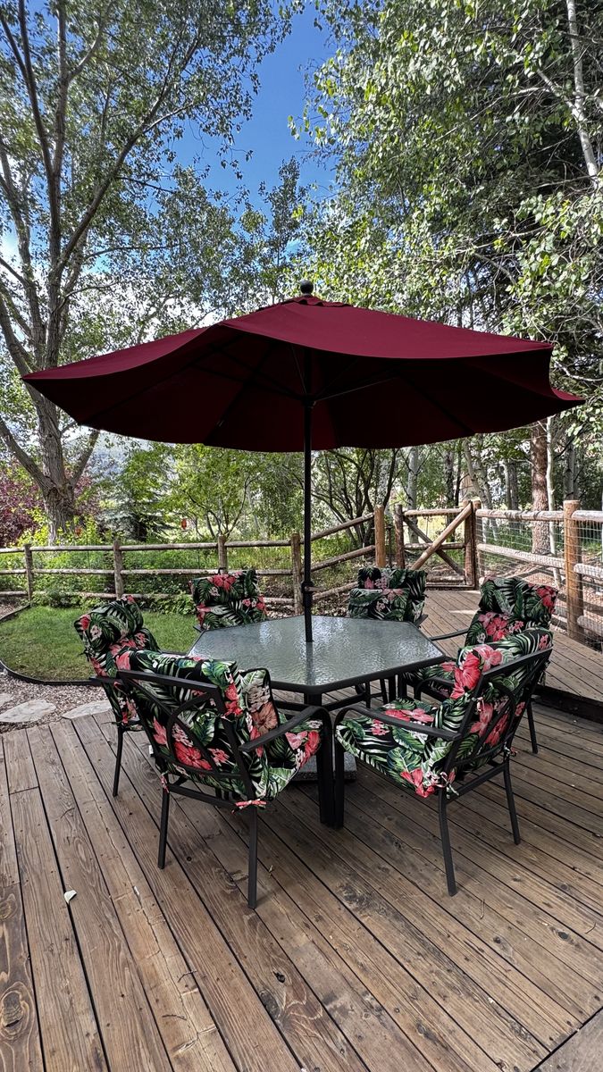 Patio Dining Set with 1 glass-top table, 6 Chairs, 2 Chaise Lounges & 2 Sunbrella Umbrellas