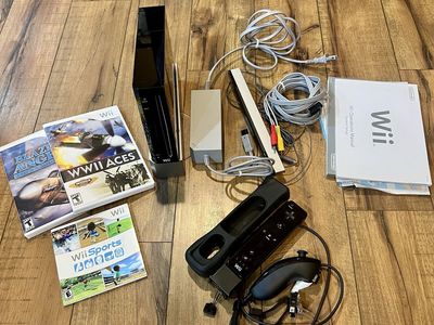 Nintendo Wii RVL-101 Black Console Bundle with 1 MotionPlus Remote & 3 Games