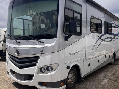 SELLING AS IS! 2013 Monaco Monarch SE 34' Dual-Slide Class A Motorhome – 14,532 Miles, Custom Remodel, New Wrap!